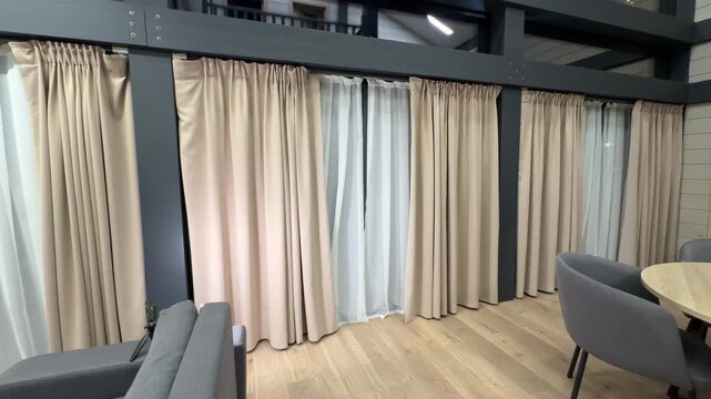 Smart home automatically opens and closes curtains in a country house, morning sunlight and evening privacy, smooth motorized tracks, candid authentic life scene at home today now.