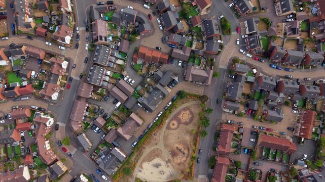 Aerial view of modern residential housing estate and suburban road network in Bedford, UK