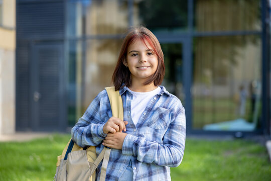 Schoolgirl student smiling ready for new academic year