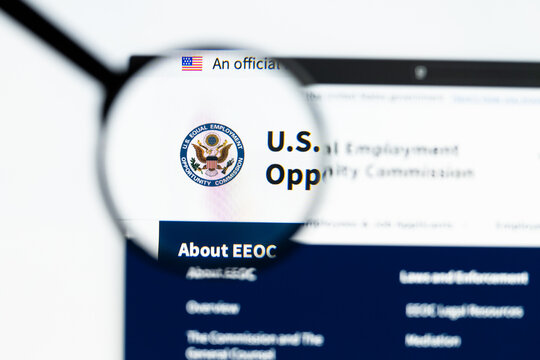 Milan, Italy 2026, 15 AGO Closeup of Equal Employment Opportunity Commission EEOC website page on a laptop screen. Focus on Equal Employment Opportunity Commission EEOC logo under a magnifying glass.