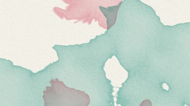 Abstract watercolor splashes in muted blue and green tones on textured paper background