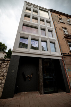 Krakow, Poland - July 18, 2026: Contemporary exterior architecture and entrance details of the boutique Warszauer Hotel in the Kazimierz district.
