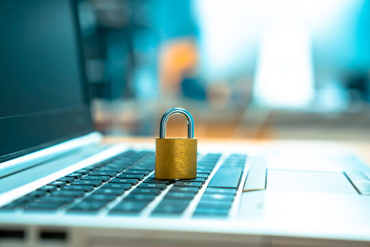 A golden lock on a laptop keyboard