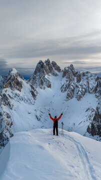 Winter Mountain Scenery with Man on Cross-Country Skis