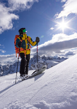 Winter Mountain Scenery with Man on Cross-Country Skis