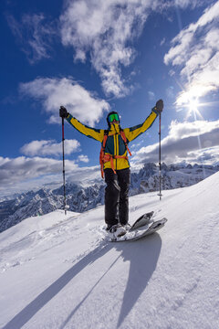 Winter Mountain Scenery with Man on Cross-Country Skis