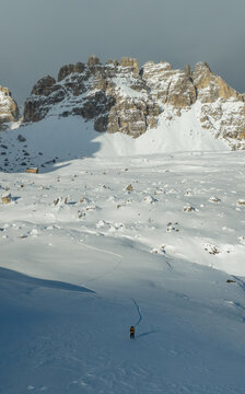 Winter Mountain Scenery with Man on Cross-Country Skis