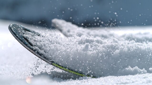 Snow Covered Ski Tip in Winter Skiing Concept