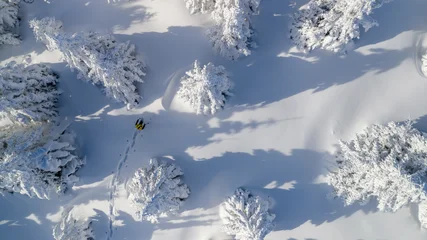 Winter Mountain Scenery with Man on Cross-Country Skis © Lukas Gojda