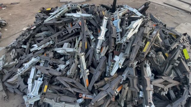 Used Automotive Metal Brackets and Car Body Mounting Parts in Salvage Yard,  Various car spare parts collected for reuse, resale, recycling, and automotive repair. Suitable for vehicle maintenance,