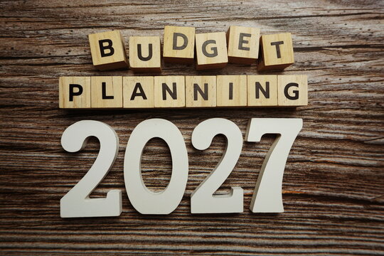 Budget Planning 2027 alphabet letters on wooden background