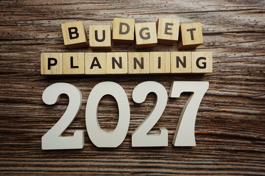 Budget Planning 2027 alphabet letters on wooden background