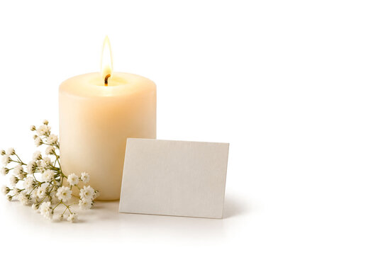 Burning Candle with Blank Card and Baby&rsquo;s Breath Symbolizing Faith, Hope and Comfort