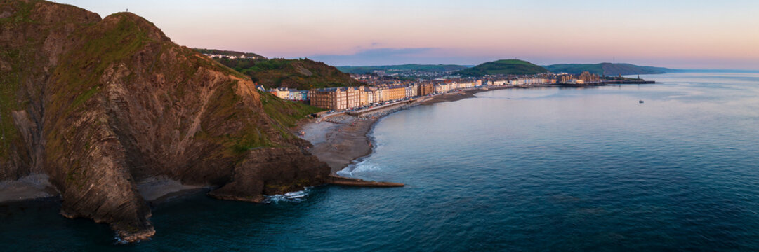 Skyline of Aberystwyth town along the coast at Dusk in Wales