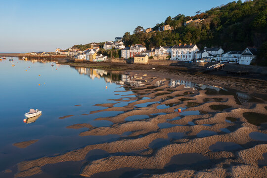 Dyfi estuary sand and mud patterns with boats and coastal houses