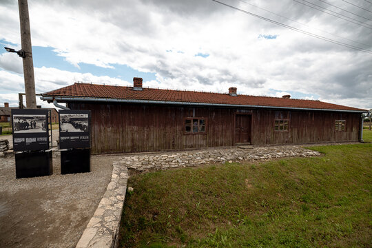 Oświęcim, Poland - July 20, 2026: Preserved barracks, guard towers, fencing and other structures at the former Auschwitz II-Birkenau Nazi concentration and extermination camp.