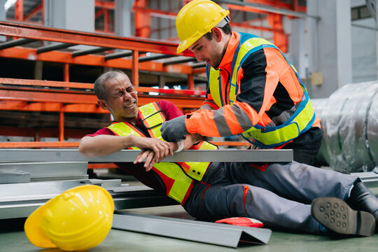 Industry metal sheet factory engineer accident pain injury hazard caution rescue worker warning emergency help protective gear safety alarm