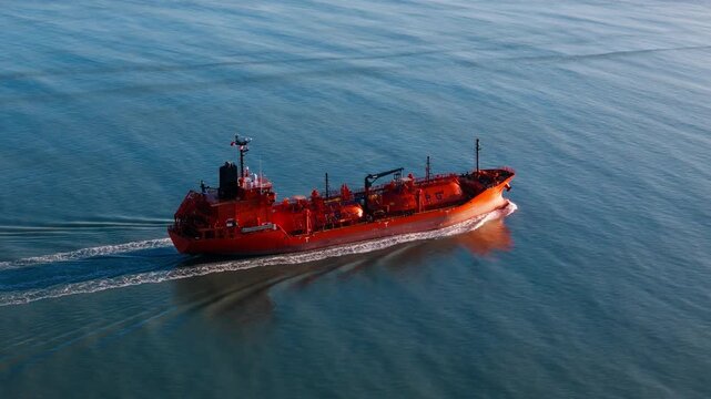 Tanker ship underway on open water carrying liquefied petroleum gas. LPG export and import by sea for shipping and energy logistics