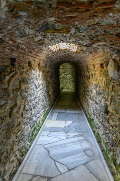 Narrow vaulted passage in the Catacomb of Saint John the Baptist beneath Hagia Sophia square, Thessaloniki, Greece