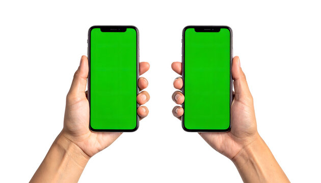 Two modern smartphones with green screen chroma key held by human hands for mobile application display on transparent background