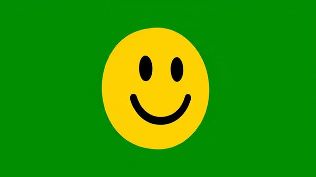 Yellow rotating smiley face turning around on vibrant green background in smooth seamless looping digital animation footage