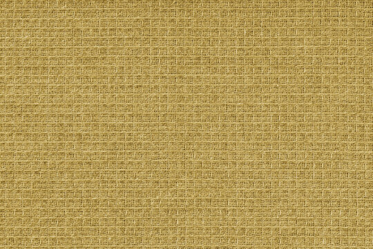 Texture of yellow waffle weave kitchen towel. Cloth, fabric with checked pattern, grid design. Close up, macro, detailed textile background, woven material structure, natural cotton material.