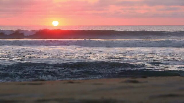 The sun rising over the Atlantic ocean at Assateague Island National Seashore, Maryland
