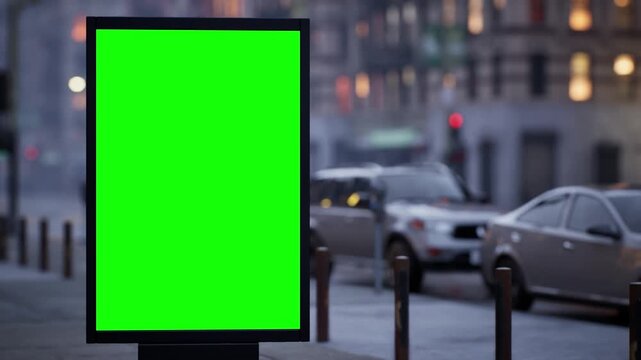 Green screen billboard mockup in a modern city in warm afternoon light, wet streets after rain. Timelapse of street traffic with defocused buildings and glowing windows in the background. Replace the