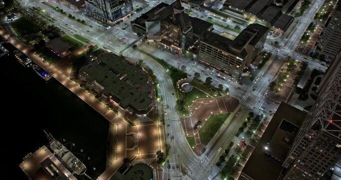 Baltimore Maryland Aerial v119 birds-eye night hyperlapse above Otterbein and Inner Harbor, revealing illuminated downtown streets and waterfront - Shot with 5k Camera - Sept 28th 2023