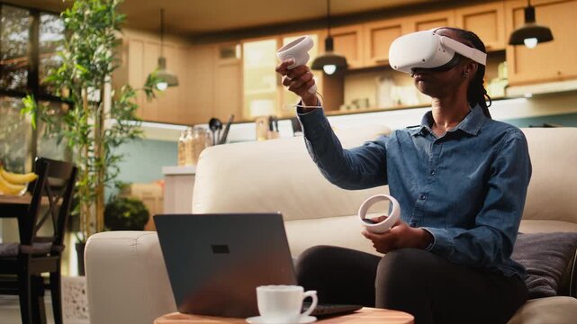 Woman freelancer using VR headset for futuristic simulation