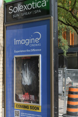 Obraz premium sign outside Imagine Cinemas Market Square a movie theatre located at 80 Front St E, Toronto (Sol’exotica, tanning salon)