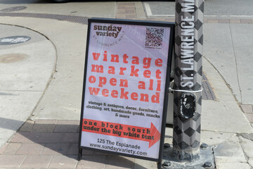 Obraz premium sidewalk a-frame poster sign for Sunday Variety Market at 125 The Esplanade, St Lawrence Market area, Toronto