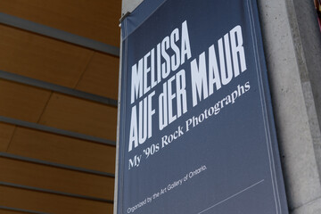 Obraz premium banner promoting the exhibition, Melissa Auf der Maur: My ‘90s Rock Photographs, outside the Art Gallery of Ontario, 317 Dundas St W, Toronto