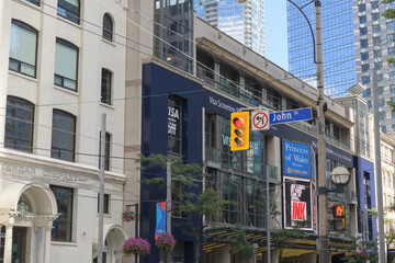 Obraz premium wide view of the historic Eclipse Whitewear Building and Princess of Wales Theatre during TIFF, 300 King St W, Toronto