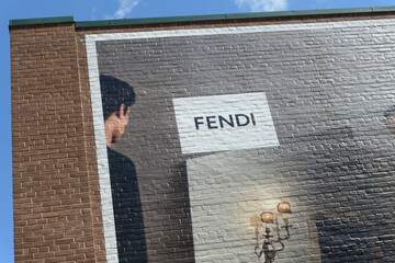 Obraz premium detail of large-scale FENDI fashion advertising, using a trompe l'oeil or graphic 