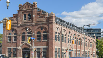 Obraz premium perspective view of Consumers Gas Company Water Gas Purifying House (Station A) designed by Bond & Smith, 1898, located at 51 Parliament St, Toronto - since renovated and repurposed as station