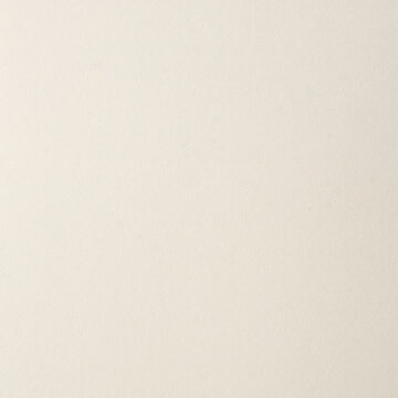 Ivory paper texture background. Warm creamy white surface of elegant white card sheet for ivory paper, warm white paper and classic luxury. Timeless off white pattern classic luxury material 