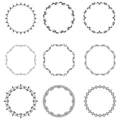 Fototapeta premium Set of nine decorative circular frames with ornate floral flourishes and intricate swirl patterns on a white background