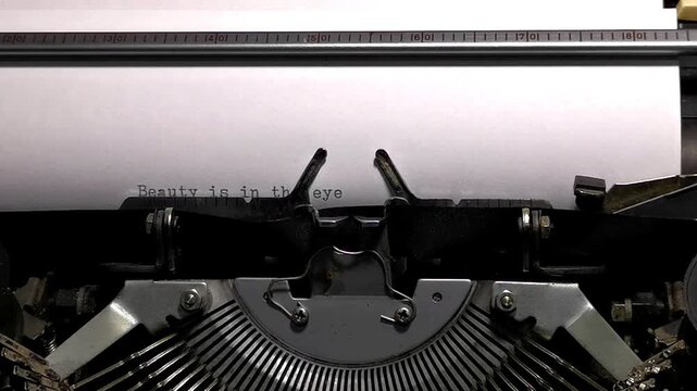 Macro Shot of Vintage Typewriter Typing Beauty Is in the Eye of the Beer Holder
