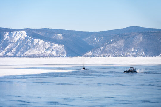A ship running on Angara river at Listvyanka a town with less than 2,000 inhabitants in Irkutsk Oblast on the shore of Lake Baikal, Russia.