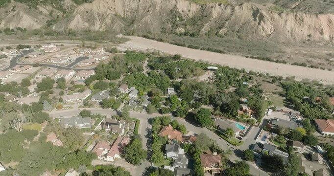 aerial view of European canyon with river and village