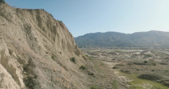aerial view of eroded badlands cliff formations