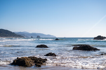 Rocky Pacific Ocean Beach on Sunny Day © Mackenzie