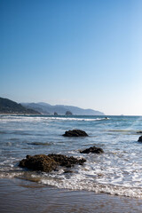 Rocky Pacific Ocean Beach on Sunny Day © Mackenzie