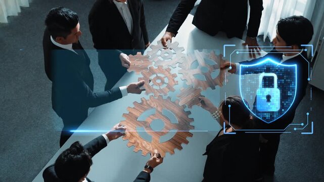 A dynamic scene of a business team working together on cybersecurity strategies. Visual cues of gears and security icons emphasize the importance of data protection in today digital landscape. Raster