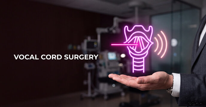 Medical professional holding glowing neon holographic projection symbolizing advanced vocal cord surgery procedures inside a modern clinical facility