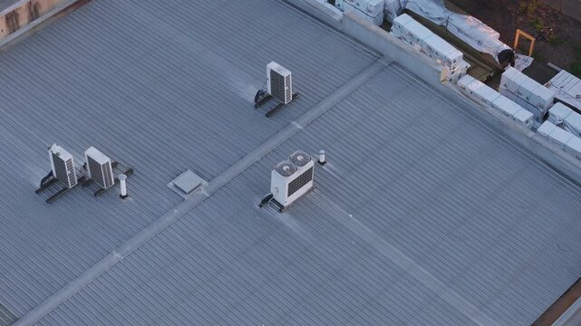 Aerial shot of industrial hvac systems on a factory roof