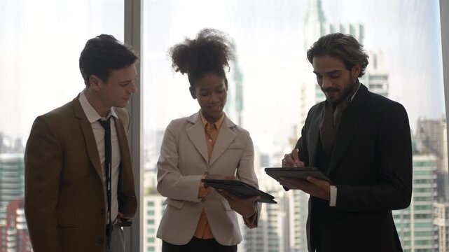 Businessman signs document on digital tablet using digitized pen