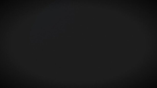 Dark moody black background texture with subtle vignette and cinematic film overlay effect