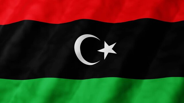 3D animation of Libya National flag waves gently seamless loop in the breeze. Red, black, green stripes wave in motion. White crescent and star center the black band. 4k motion graphics background.